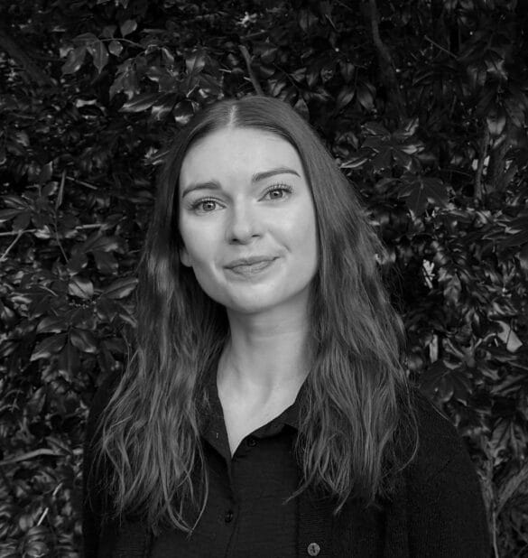 Ebony Matthews, Educational & Developmental Psychologist at Integrated Wellness Clinic, Brisbane, with natural greenery background.