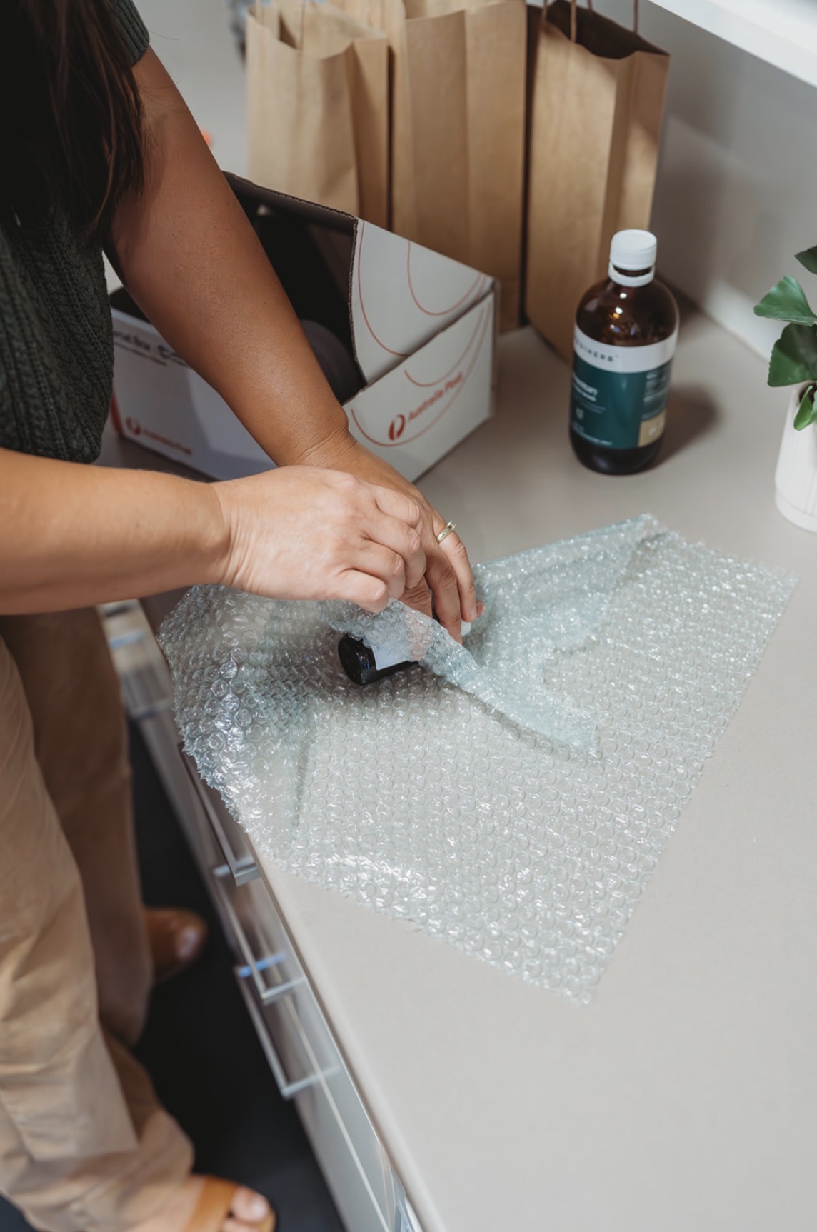 Integrated Wellness Clinic packaging practitioner-recommended supplements and herbal medicine for delivery throughout Australia and internationally
